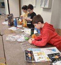Campers work on their Orbiting Solar System Kit