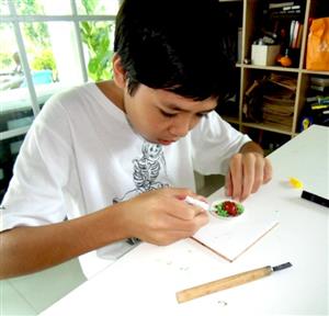 Campers work with Polymer Clay to create magnets