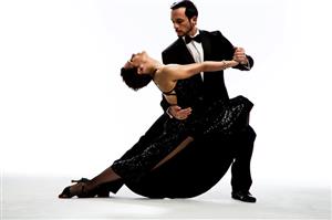 A dancing couple dances to Argentine Tango
