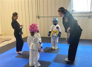 Children participate in karate 