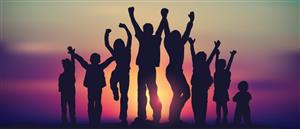 Sunset silhouette of a group of children